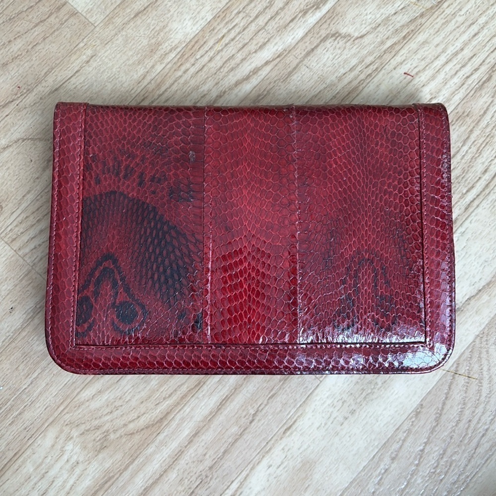 Red crocodile skin textured clutch